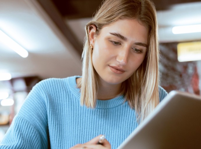 Woman looking at a tablet