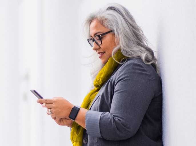 Woman looking at her cell phone