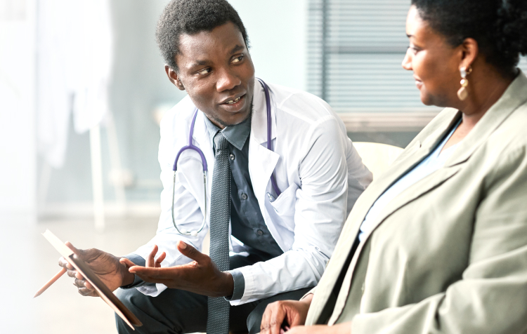Doctor talking with patient