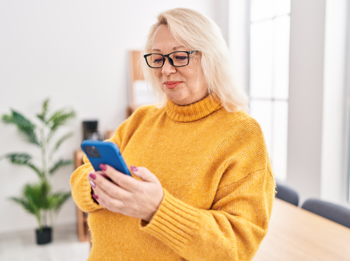 Woman looking at her cell phone