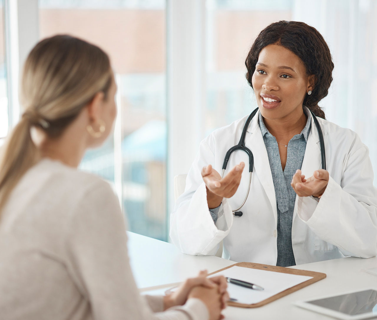 Nurse smiling at patient