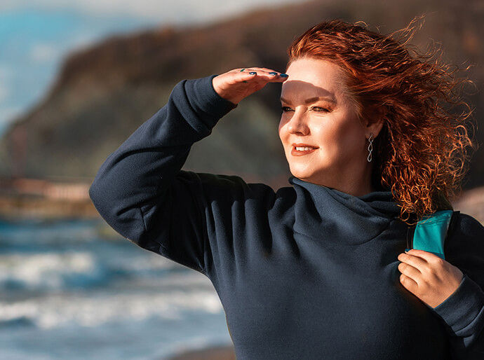 Woman looking at the ocean