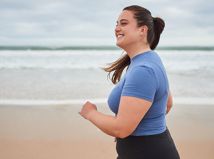 Woman running on a beach