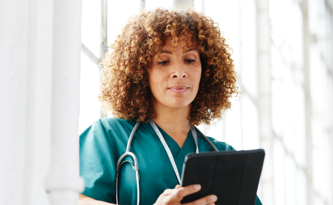 Doctor looking at a tablet