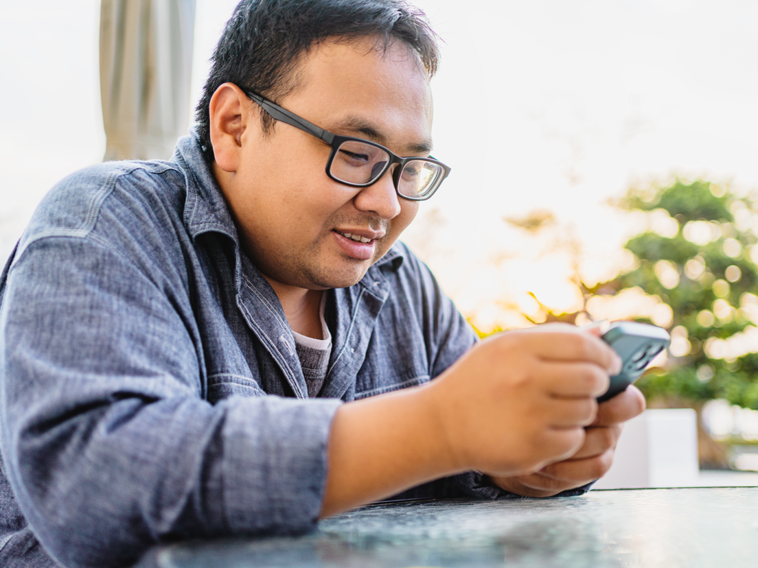 Man looking at his cellphone