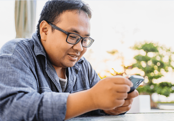 Man looking at his cellphone