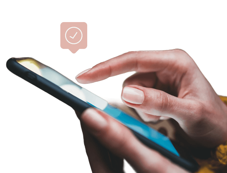 Finger tapping on phone with floating checkmark icon