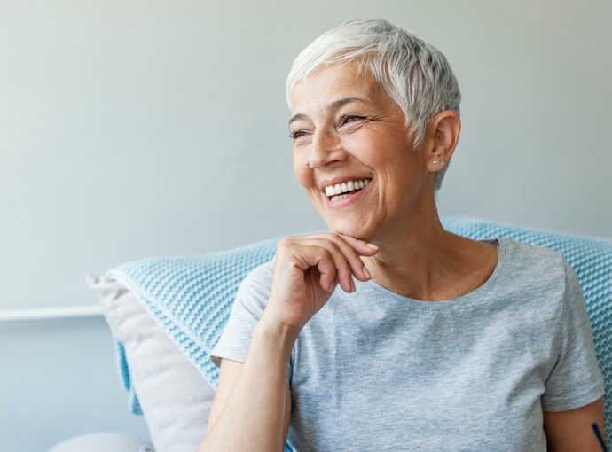 Older woman sitting on couch